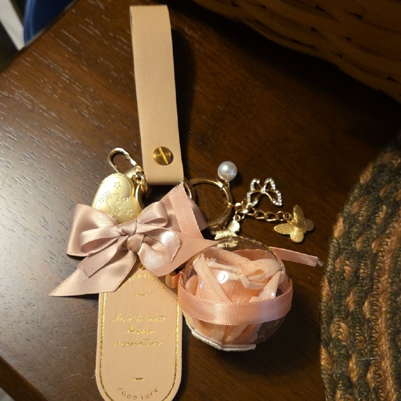 Elegant Tan Bag Charm Keychain with Bow and Charms - Picture 1 of 5